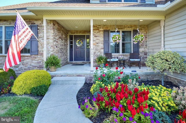 property entrance with covered porch