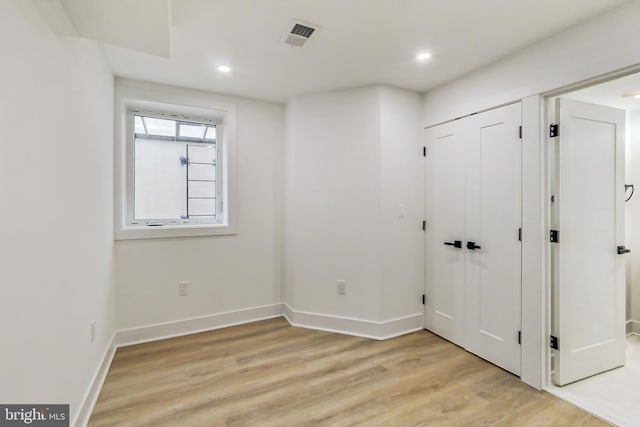 empty room featuring light hardwood / wood-style floors