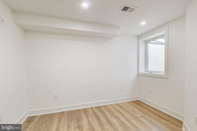 empty room with light wood-type flooring