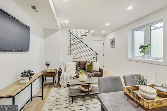 living room featuring light wood-type flooring