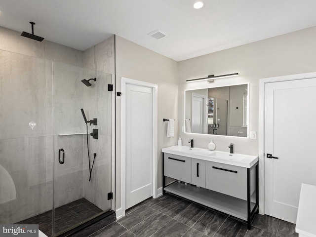 bathroom featuring vanity and walk in shower