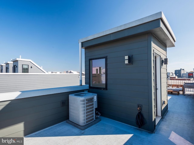 view of outdoor structure with central AC