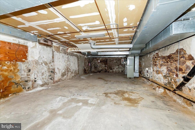 basement featuring heating unit