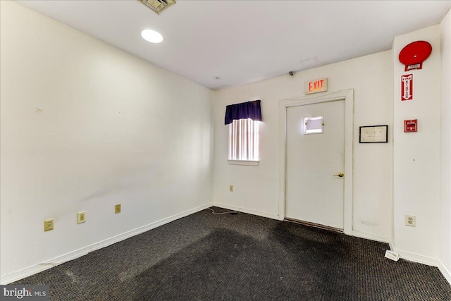 entrance foyer with carpet floors