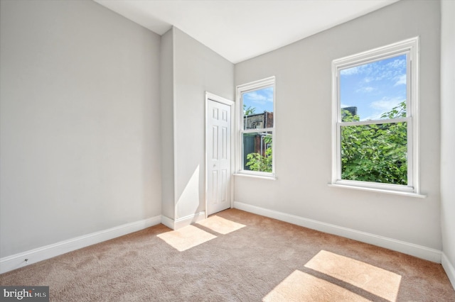 view of carpeted spare room