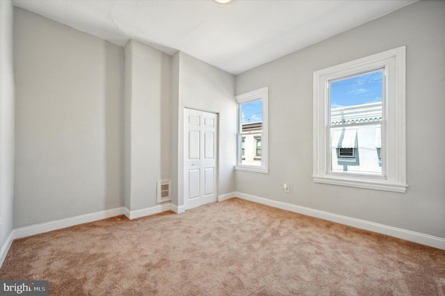 view of carpeted spare room