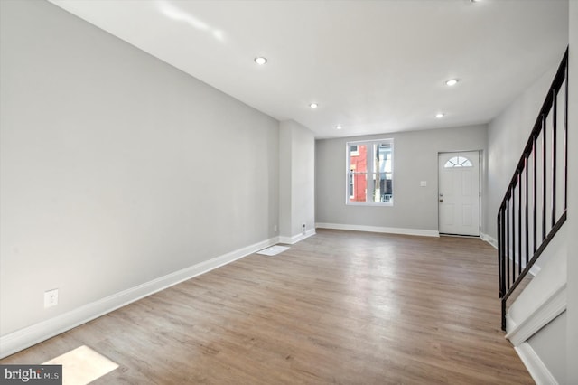 foyer with light wood-type flooring