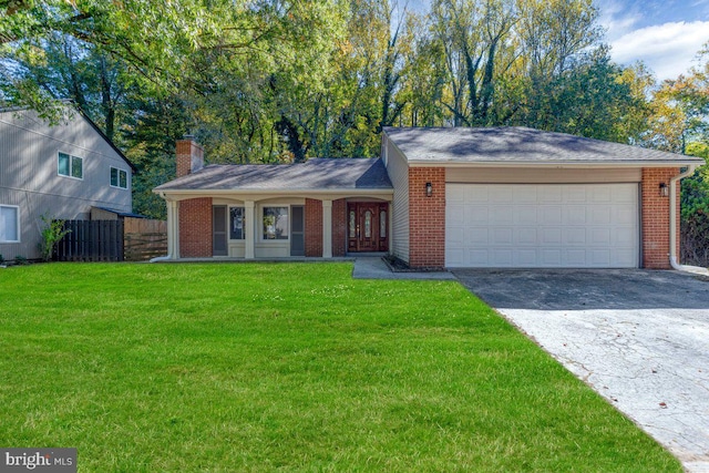 ranch-style house with a chimney, brick siding, fence, aphalt driveway, and a front yard
