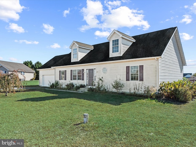 cape cod house with a front yard and a garage