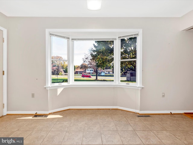 view of tiled empty room