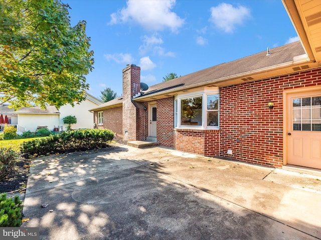 view of front of house with a patio