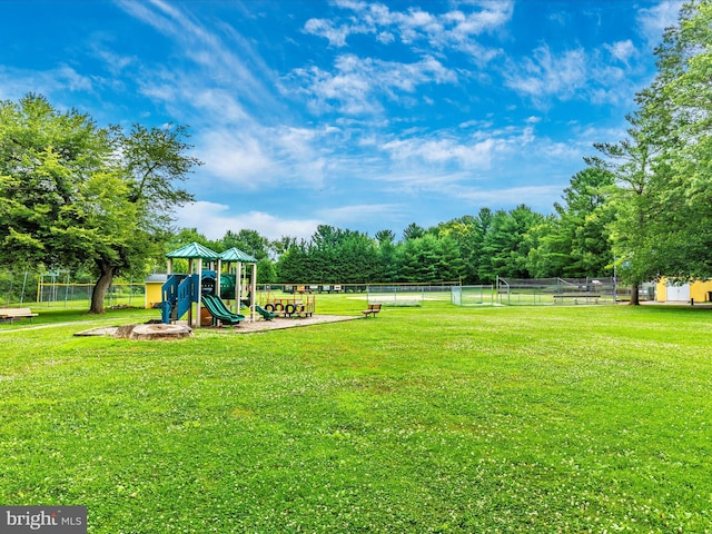 view of jungle gym with a yard