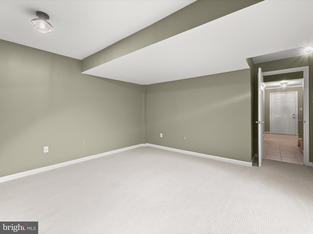 additional living space featuring carpet flooring