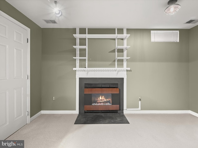 unfurnished living room with carpet floors