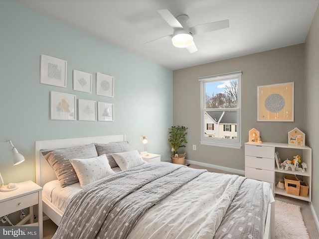 bedroom featuring ceiling fan and light hardwood / wood-style floors