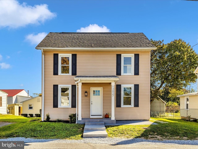 view of front of house with a front lawn