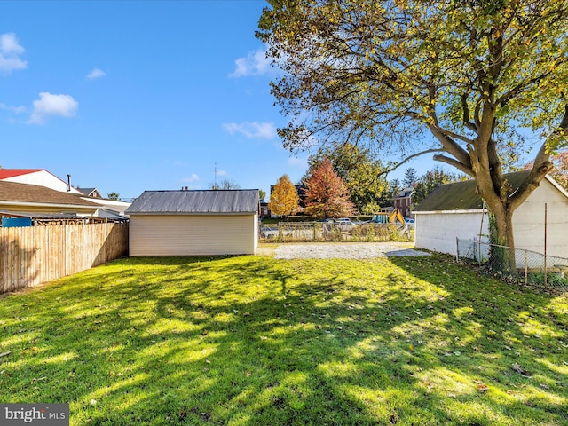 view of yard with a storage unit