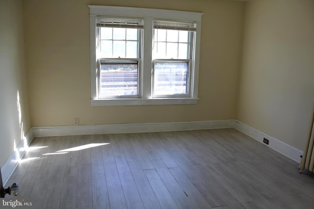 empty room featuring light hardwood / wood-style floors