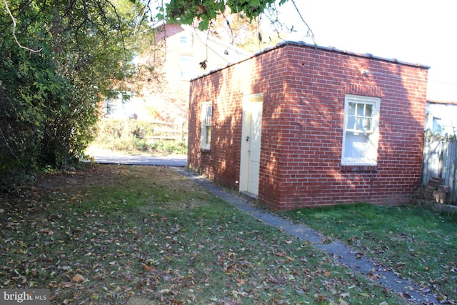 view of property exterior featuring a yard