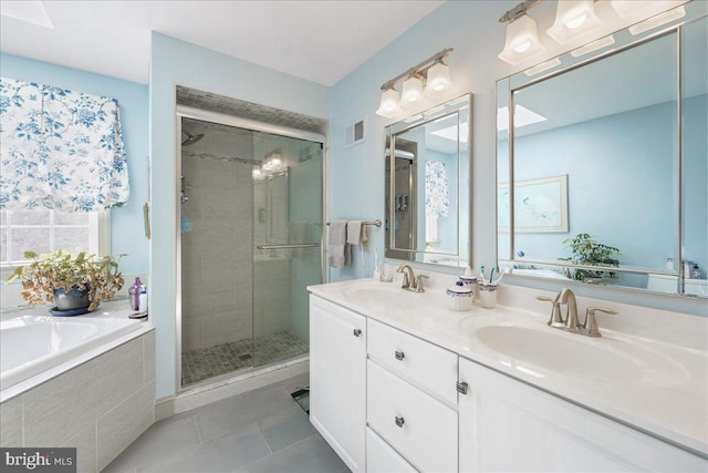 bathroom featuring separate shower and tub, tile patterned flooring, and vanity