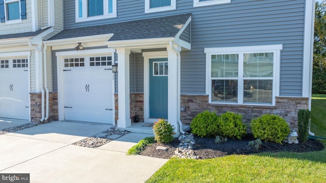 property entrance with a garage