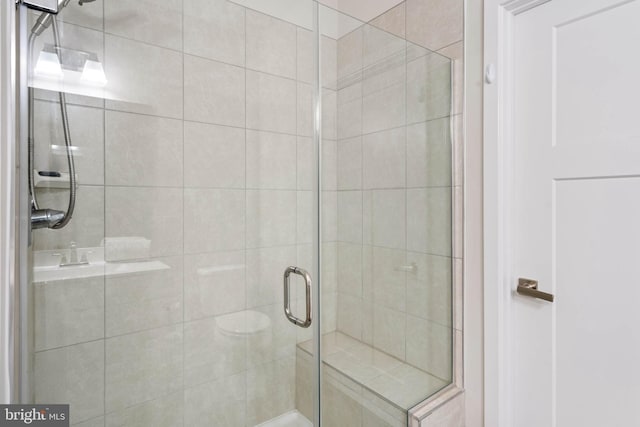 bathroom featuring walk in shower