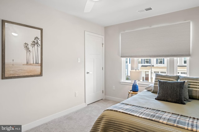 carpeted bedroom featuring ceiling fan