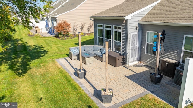 view of patio featuring central air condition unit and outdoor lounge area