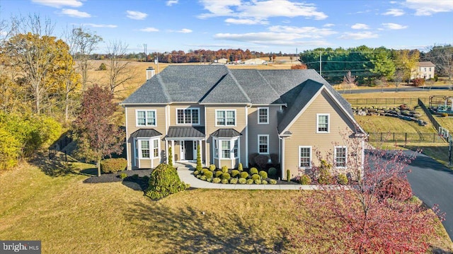 view of front of property with a front yard