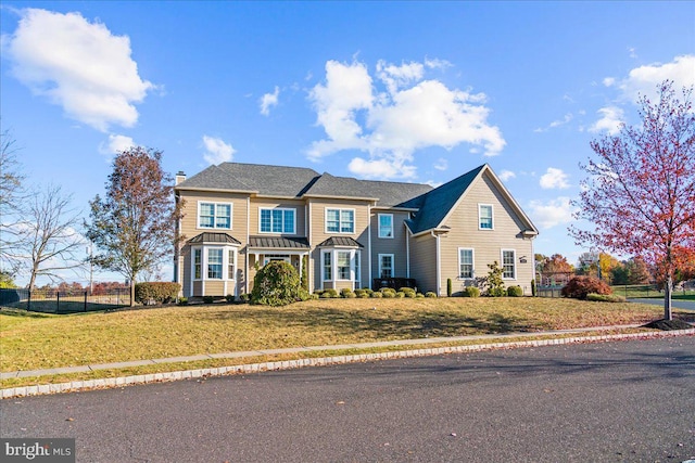 view of front of property with a front yard