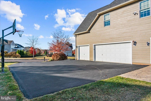 view of home's exterior with a garage