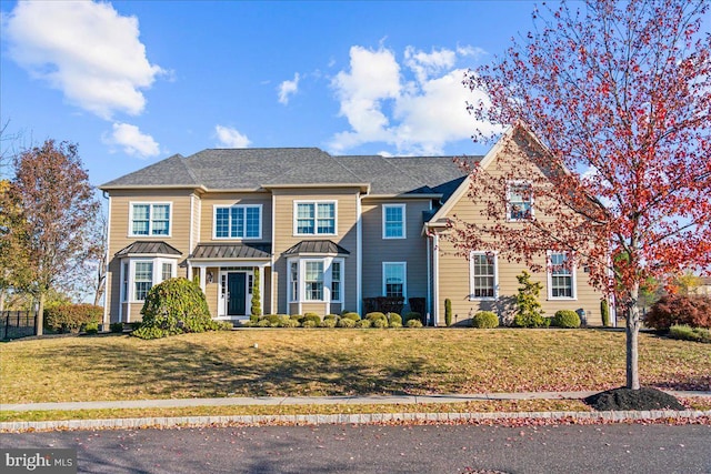 view of front of property with a front yard