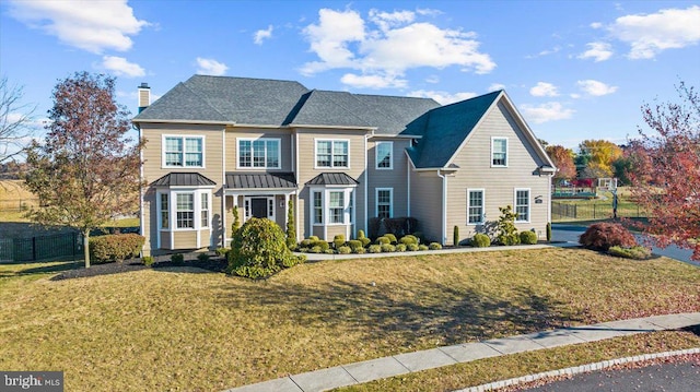 view of front property with a front yard