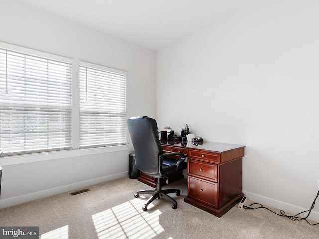 view of carpeted office space