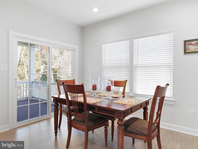 dining space featuring light hardwood / wood-style flooring