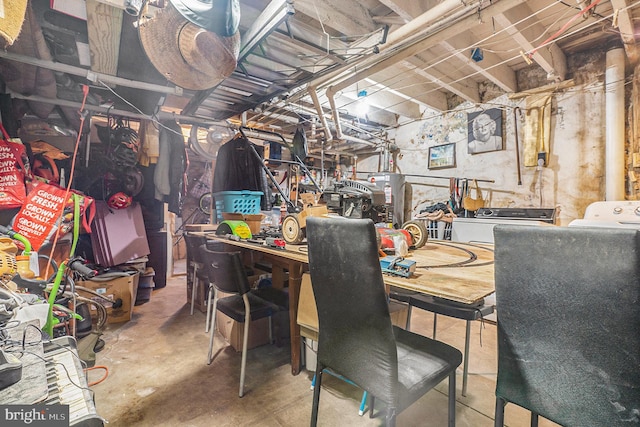 basement with a workshop area