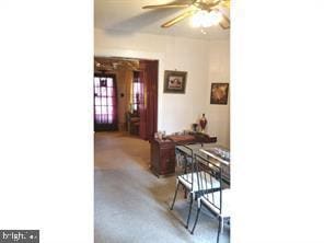 hallway with carpet floors