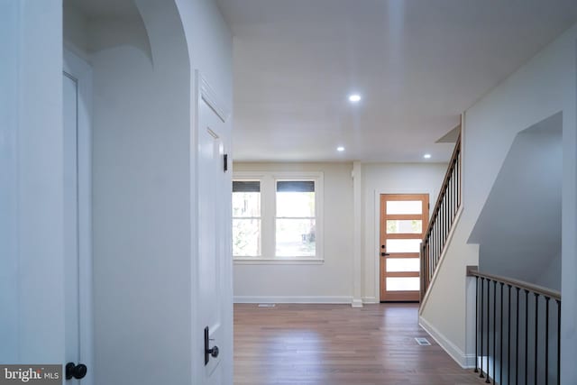 hall featuring hardwood / wood-style flooring