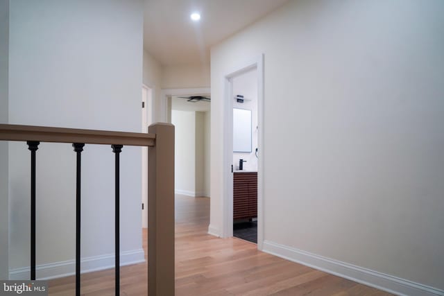 staircase featuring hardwood / wood-style flooring