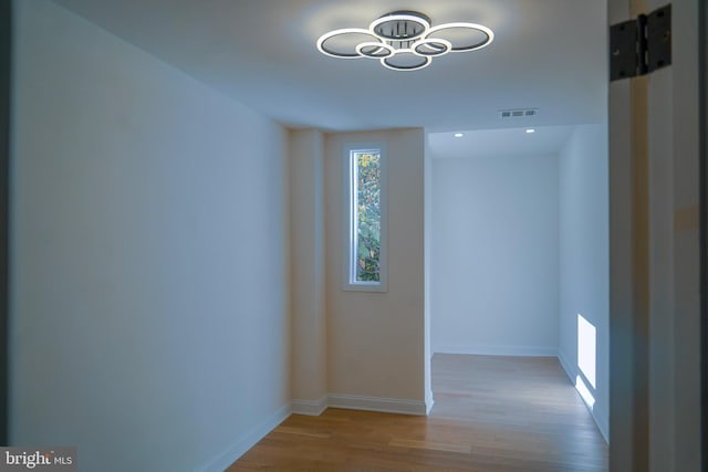 hallway featuring light hardwood / wood-style flooring