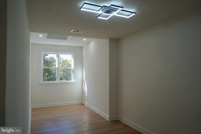 empty room with light hardwood / wood-style floors