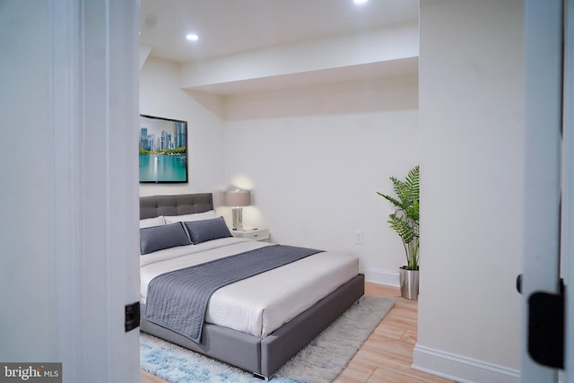 bedroom featuring light hardwood / wood-style floors