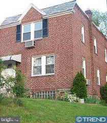 view of home's exterior with a lawn