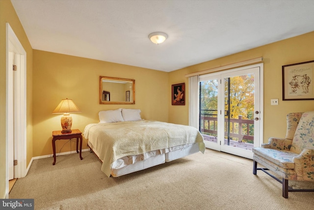 bedroom featuring carpet flooring and access to outside