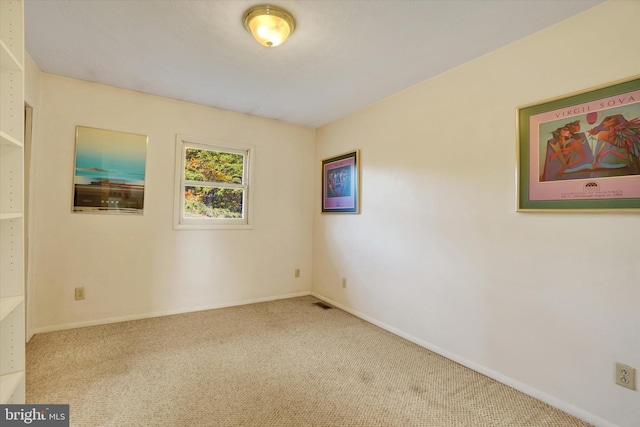 view of carpeted spare room