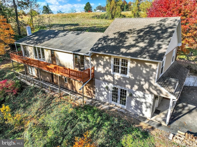 rear view of property with a patio and a deck