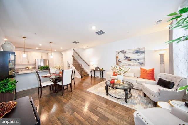 living room with dark wood-type flooring