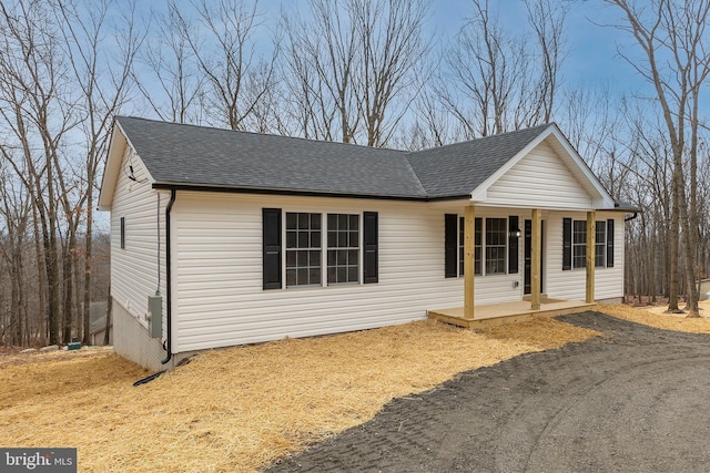 ranch-style house featuring a porch