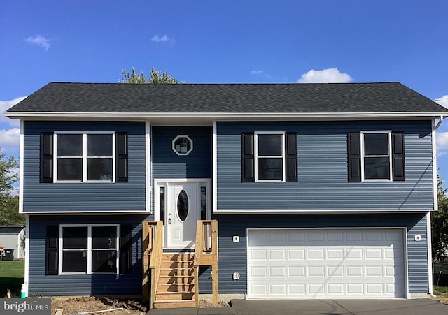 raised ranch with a garage