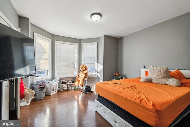 bedroom featuring dark hardwood / wood-style floors